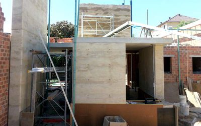Rammed earth walls take shape as feature in new Coogee house